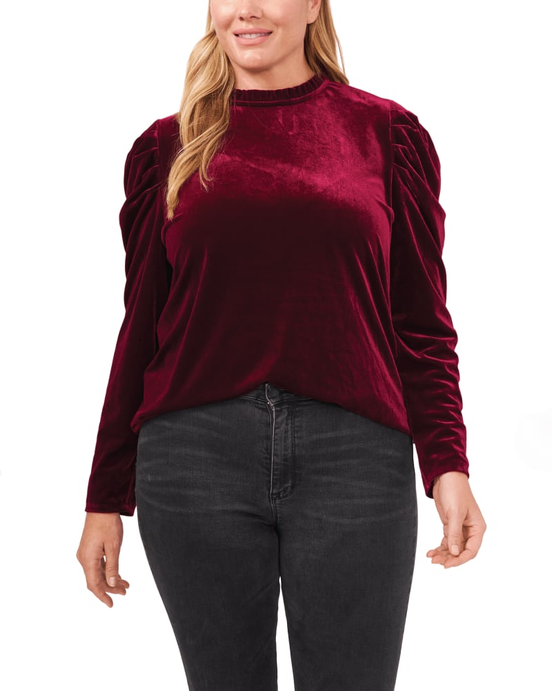 Front of a model wearing a size 1X Amaya Velvet Ruffle-Neck Top in 584-MAJESTICWINE by CeCe. | dia_product_style_image_id:263804